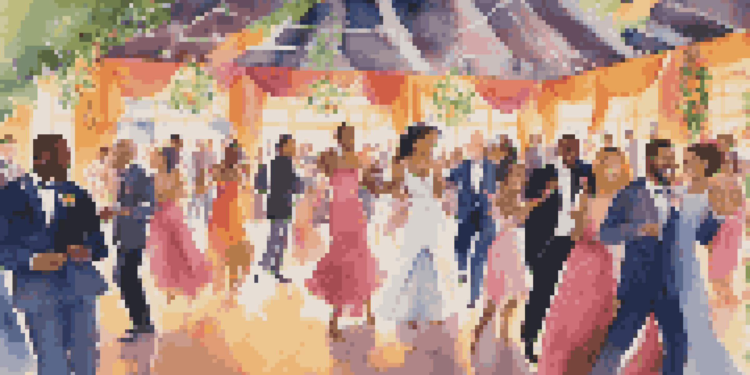 A lively wedding celebration with diverse guests dancing under colorful decorations, illuminated by warm lighting.