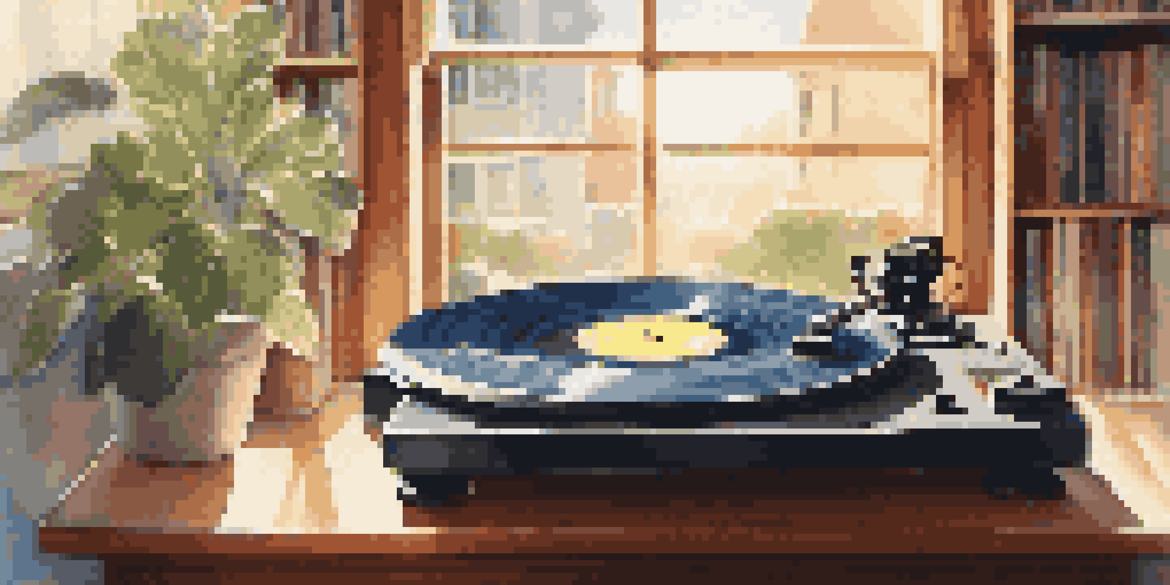 A vinyl record spinning on a turntable with sunlight streaming through a window.