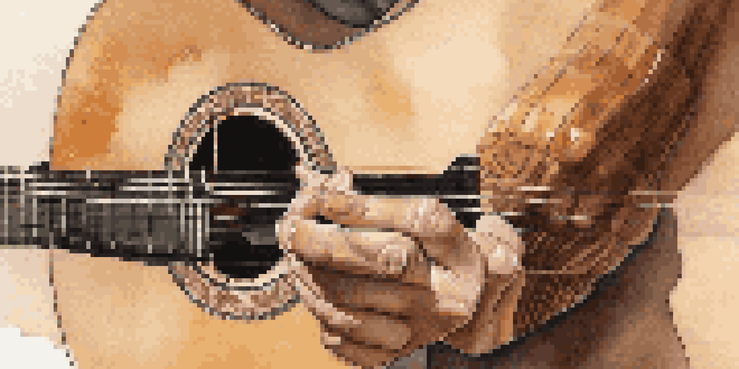 A close-up view of a classical guitar fingerboard with fingers positioned above the strings, showcasing the warm wood tones and soft lighting.