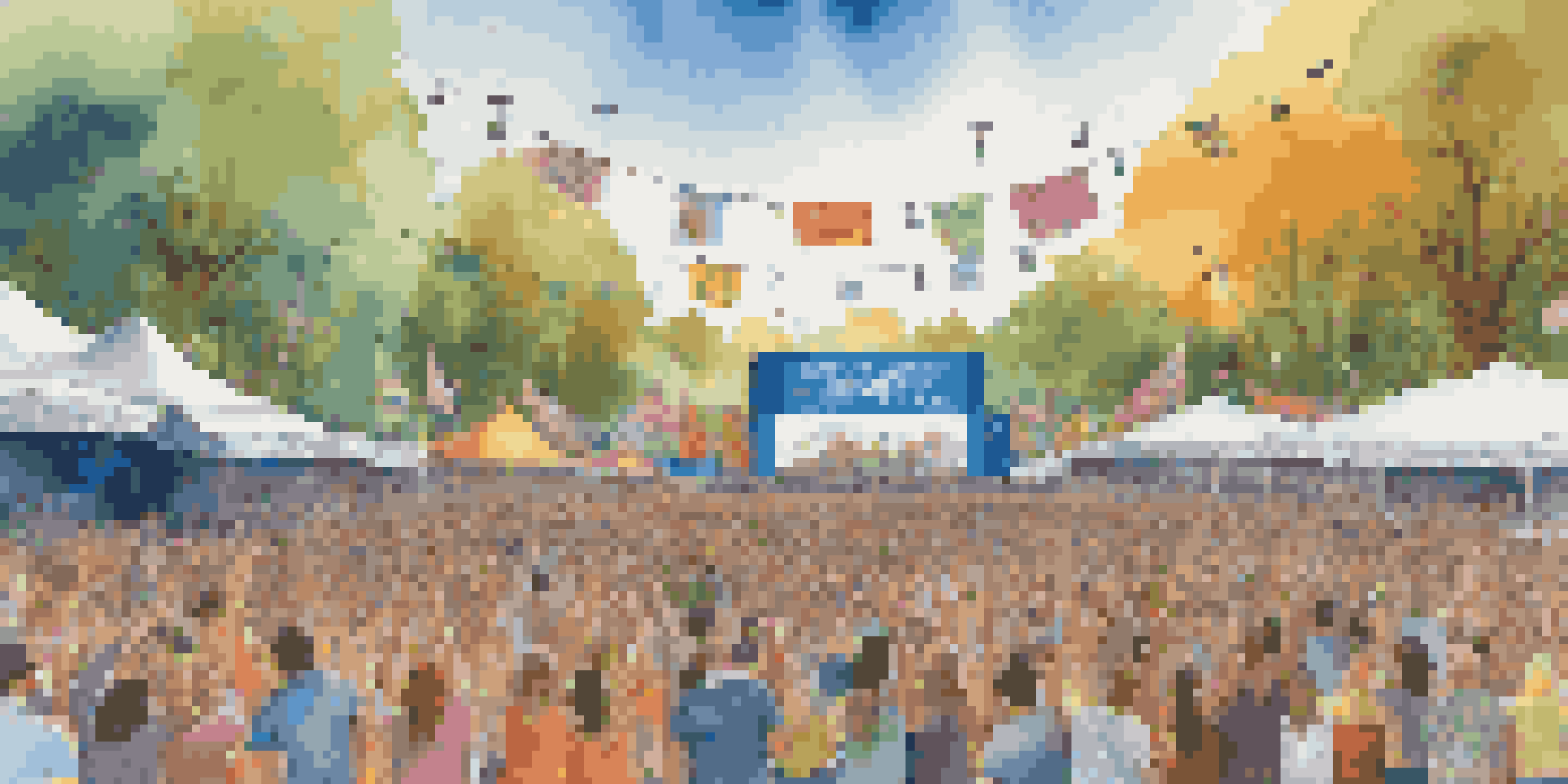 A lively music festival with a diverse crowd enjoying performances, colorful environmental banners, and a bright blue sky.