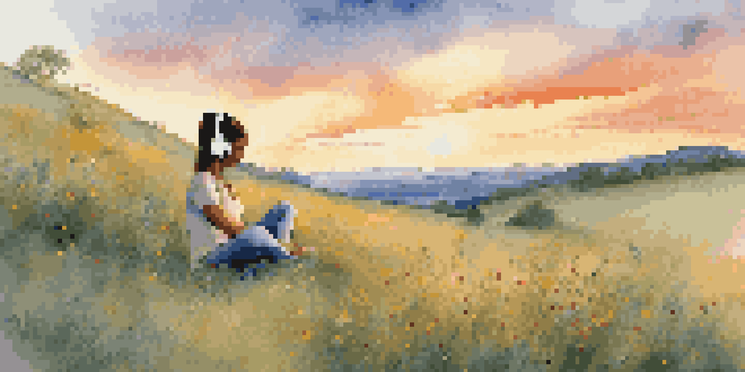A person meditating on a grassy hill with headphones, surrounded by wildflowers under a colorful sunset.