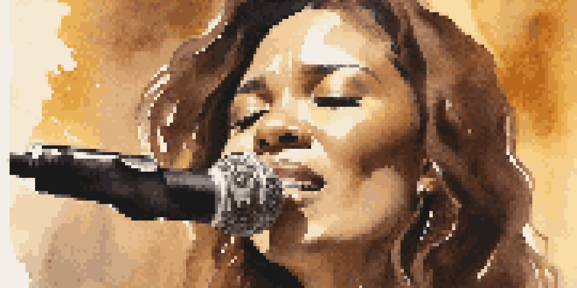 A singer performing on stage with closed eyes, expressing deep emotion, illuminated by warm golden lights.