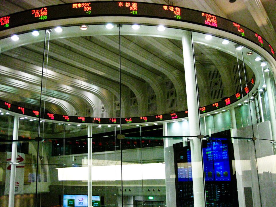 Tokyo Stock Exchange's so-called Market Center. The real stock trading floor closed in 1999. In its place is now just a glass cylinder, a few screens and a silly ticker—something for clueless journalists to shoot when reporting on Japan's e