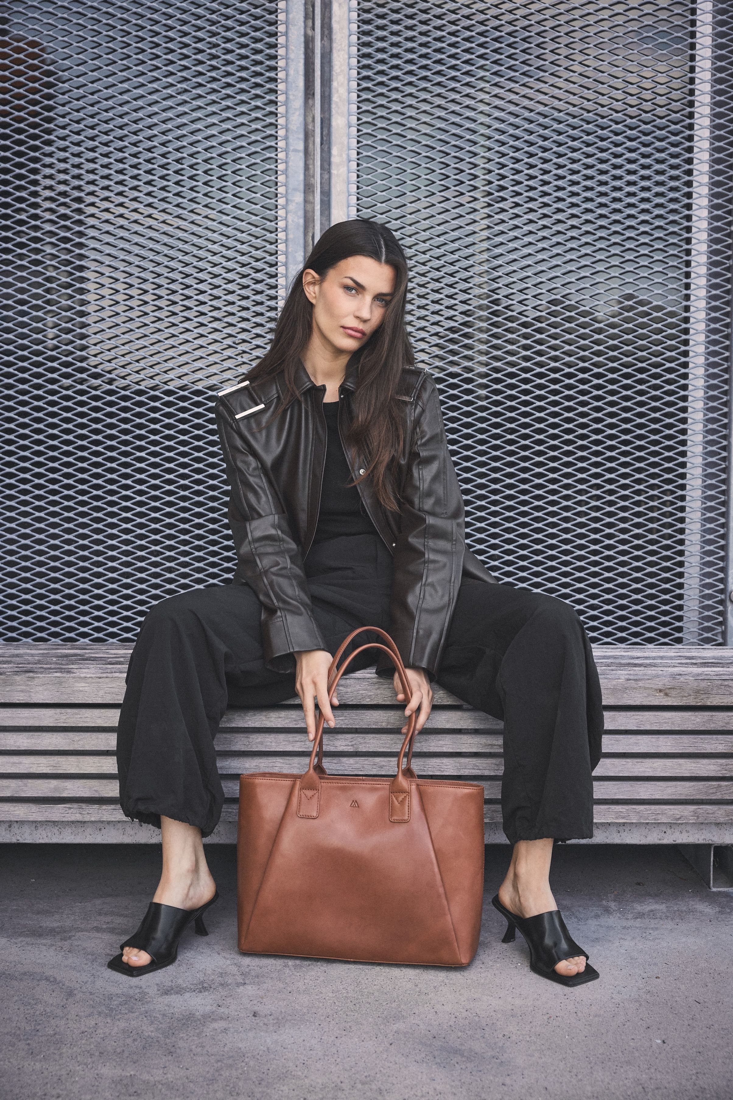 Markberg model showing brown leather bag