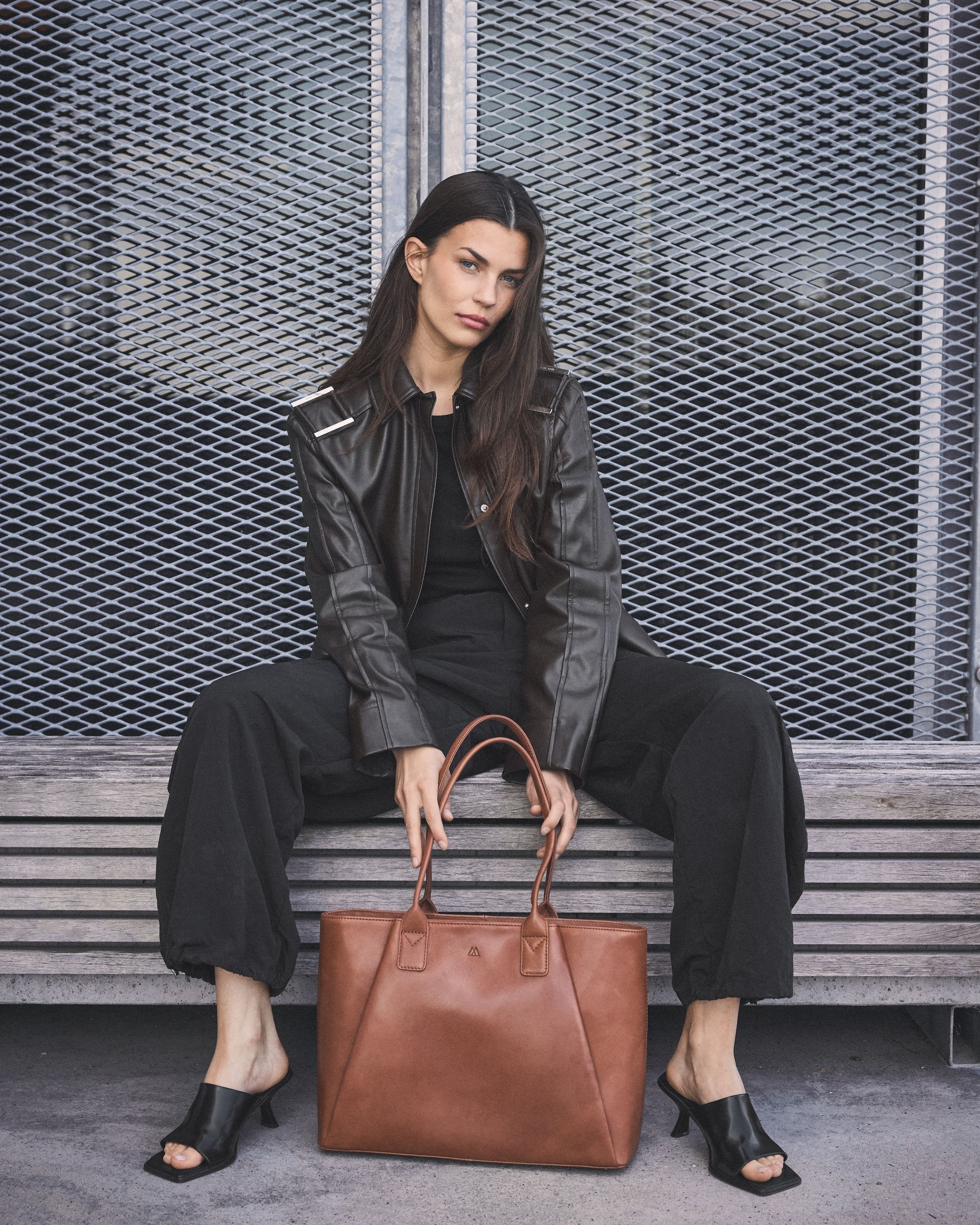 Markberg model showing brown leather bag