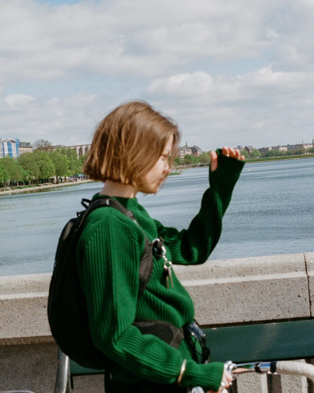 Model wearing Andersen-Andersen green knitwear