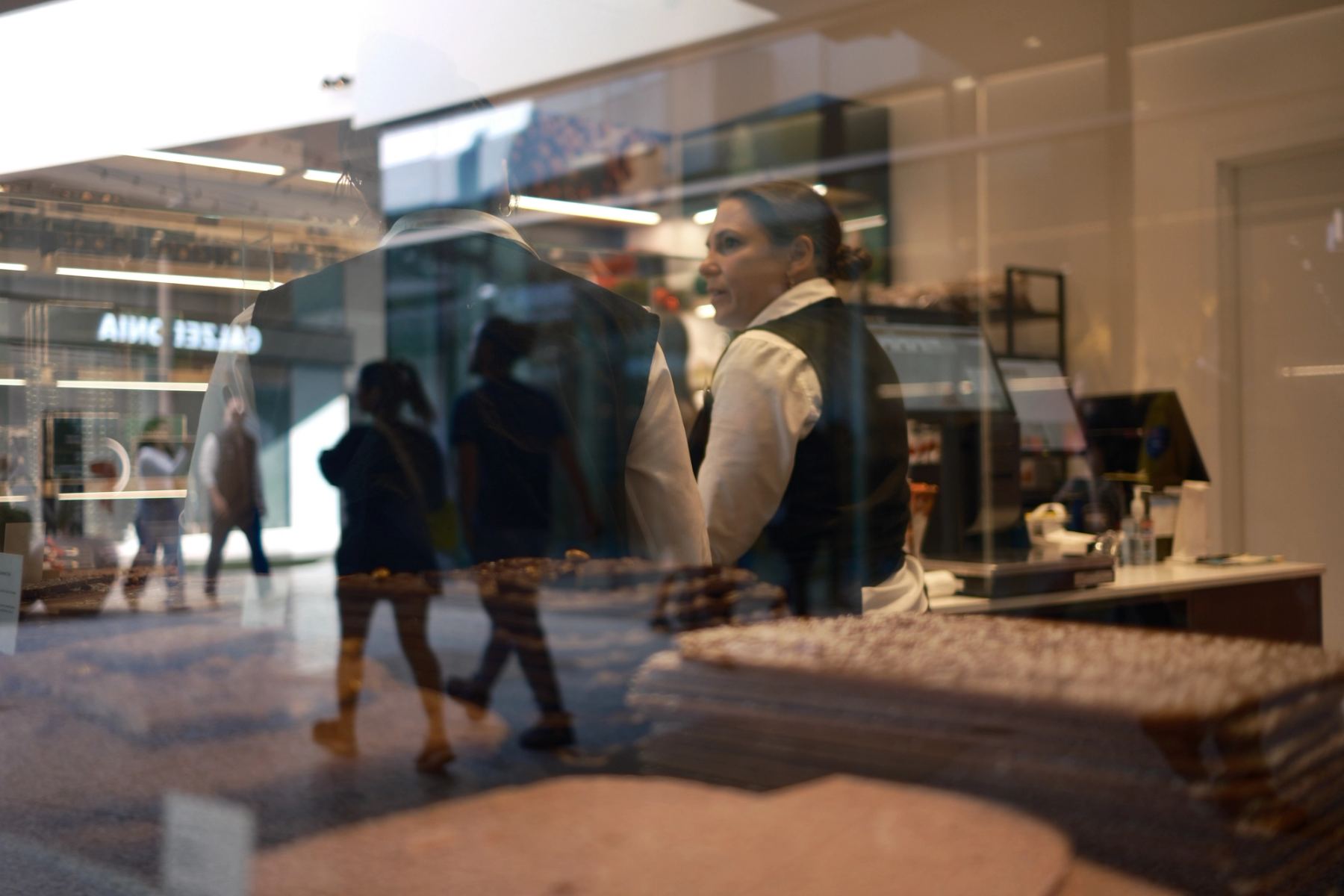 People working in a chocolate shop
