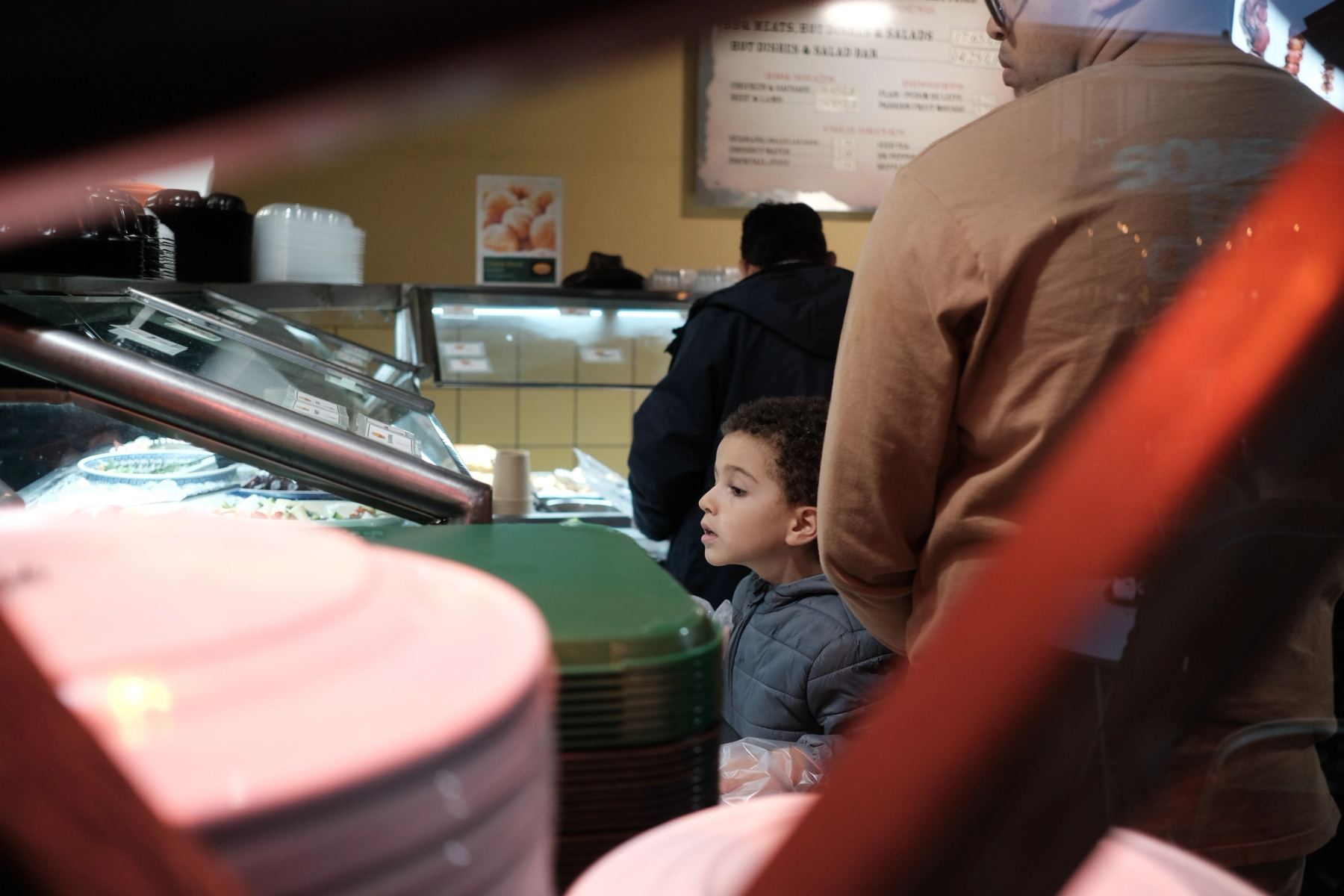 A kid looking at food