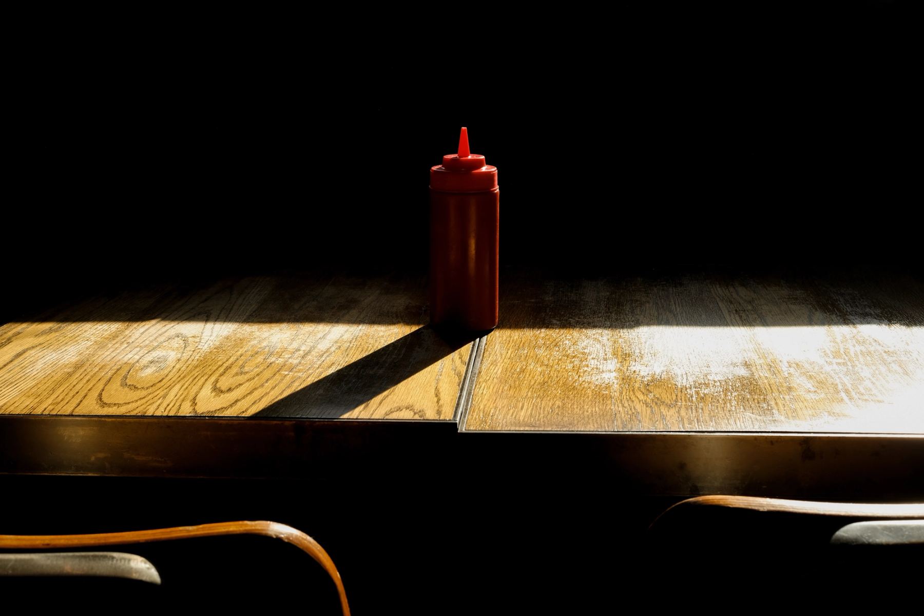 A ketchup bottle on a table
