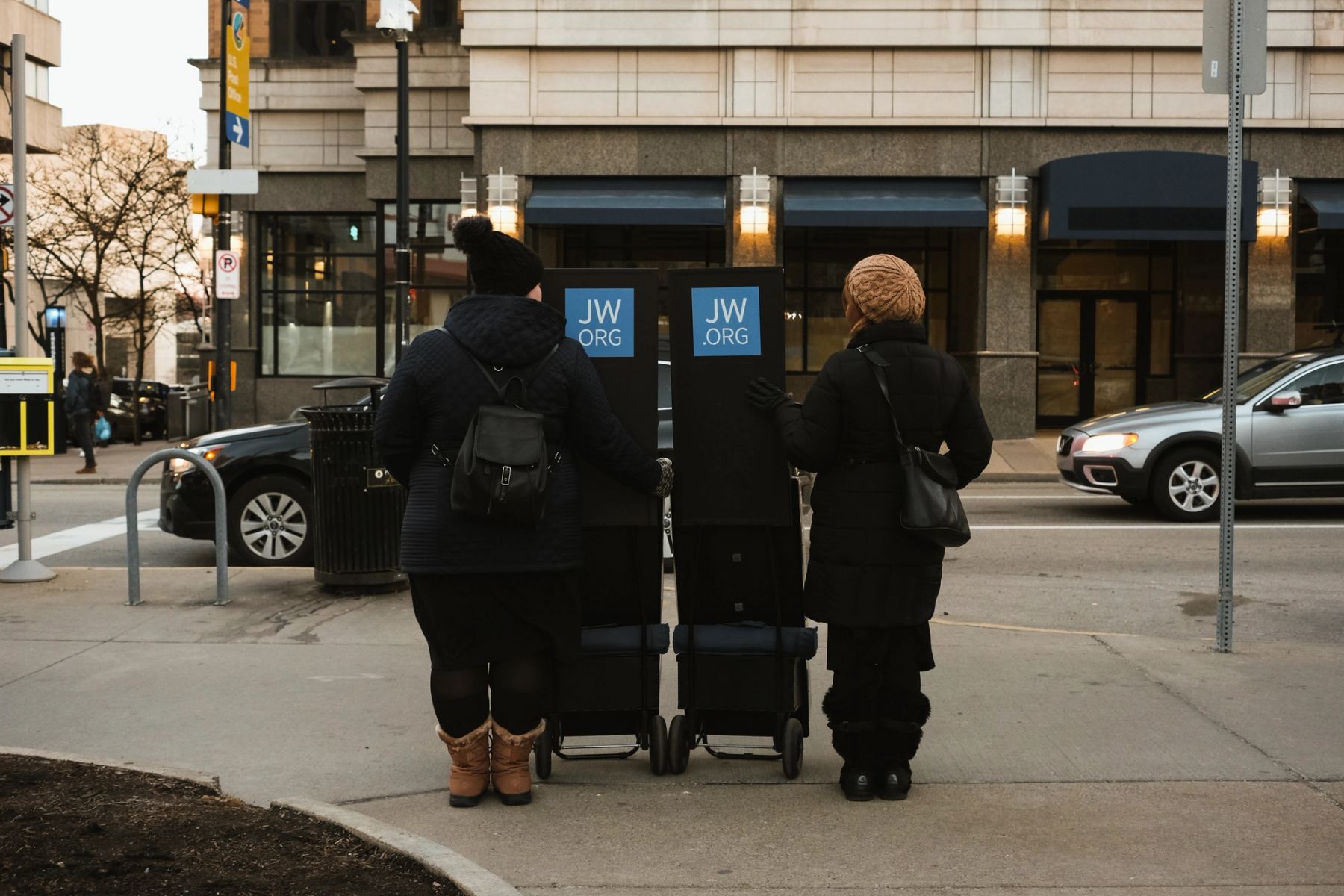 Two women standing on the street