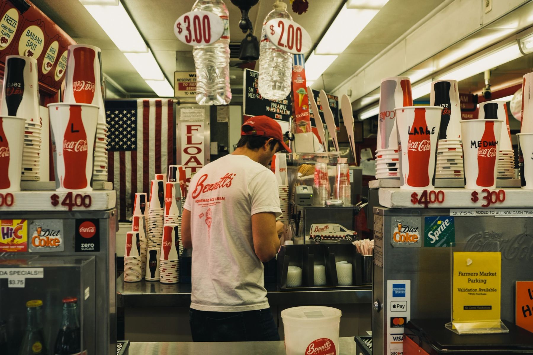 A man working in a soda shop