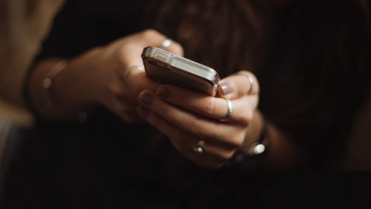 Person holding a smart phone