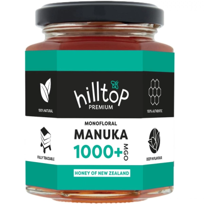 A jar of Hilltop Premium 1000, a top 5 manuka honey for MGO or UMF count.