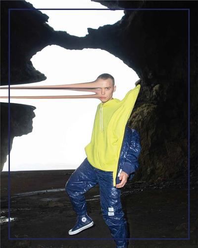Man standing his head melting sideways appearing to mutate. Converse x P.A.M. (Perks and Mini) collab. 