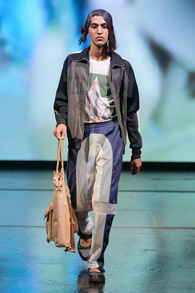 runway model wearing telfar x converse collaboration