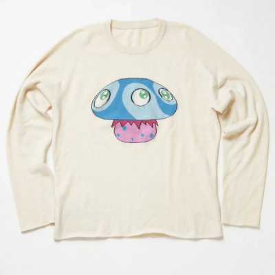 white sweater with a mushroom with eyes