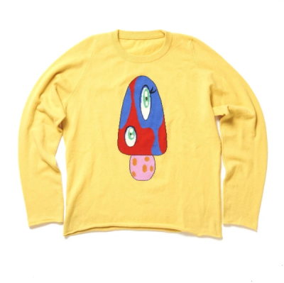 a yellow sweater with an image of a mushroom with eyes