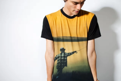 MAN MODELING A FLY FISHING TEE