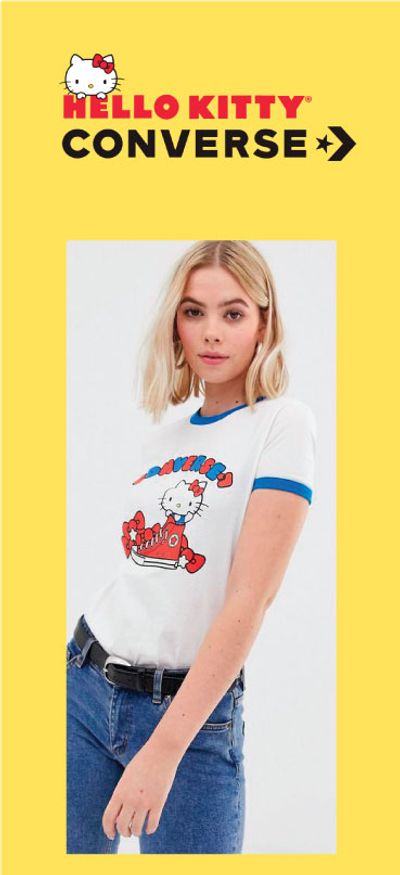 A photo of a woman in jeans and a tee