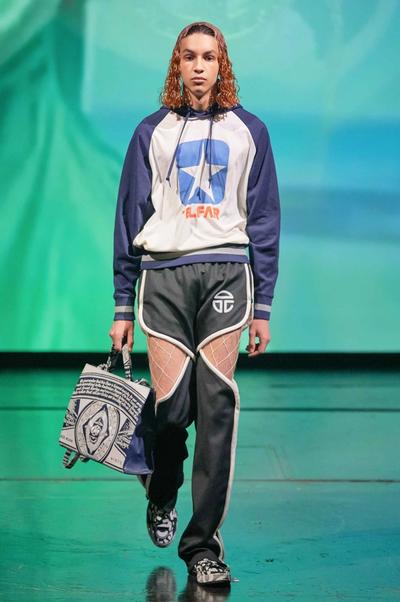 runway model wearing telfar x converse collaboration