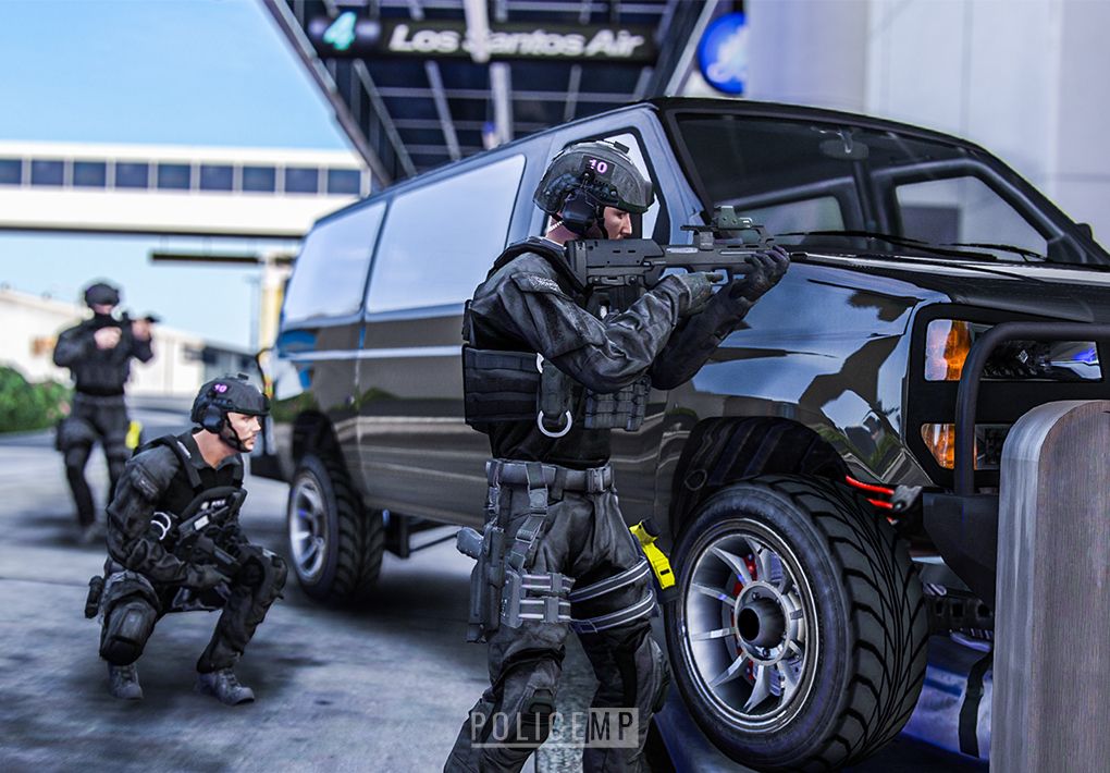 Authorised Firearms Officers covering the entrance