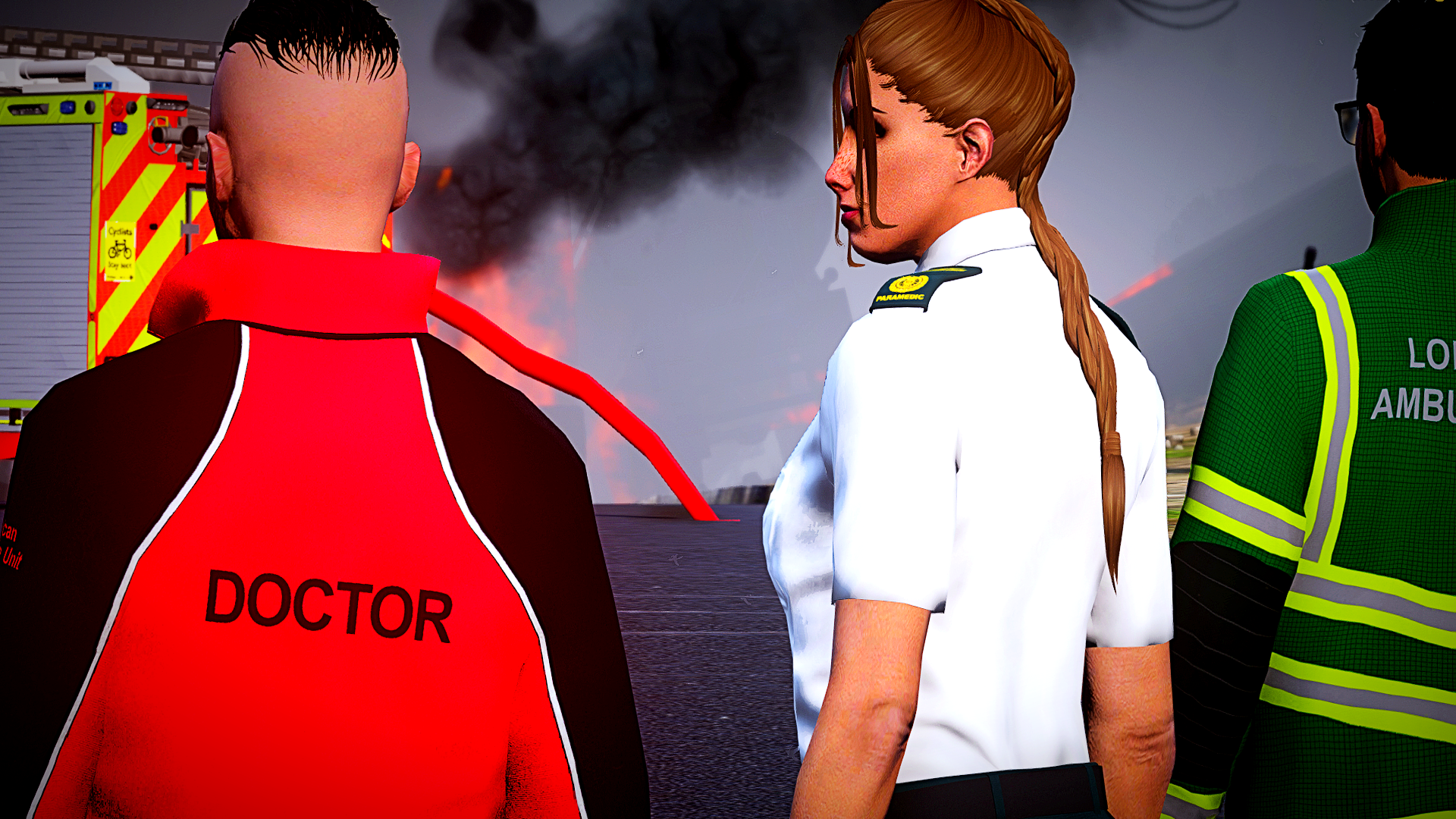 Operations Manager Nicola Consulting with a doctor on scene