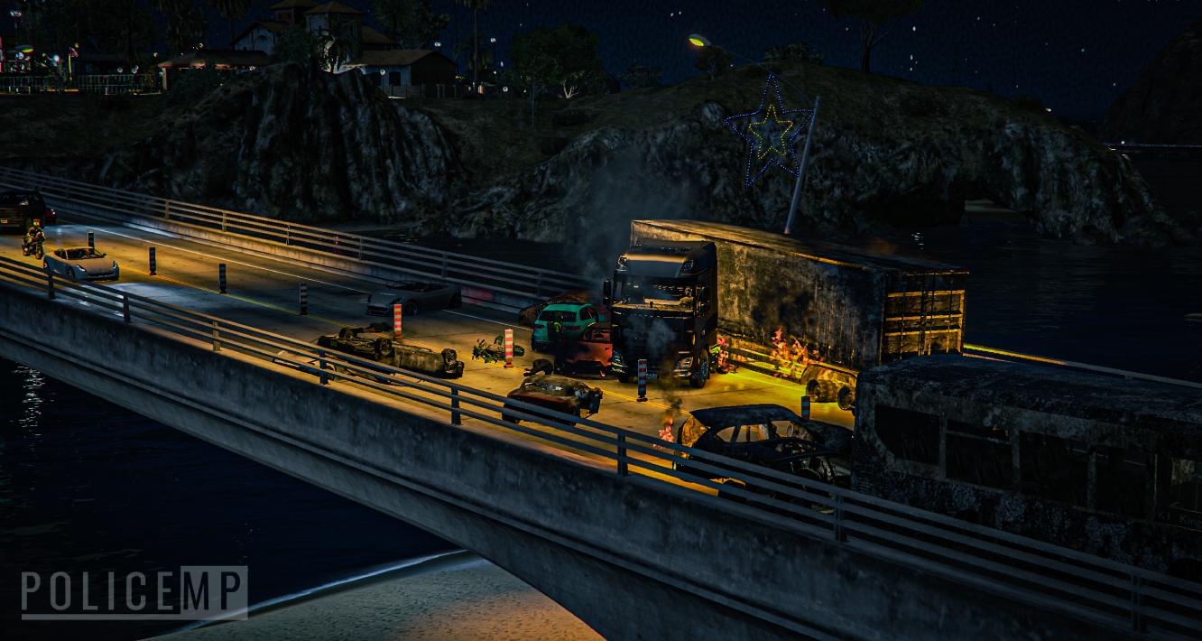 Traffic Gridlock After Major Road Traffic Collision Sends Vehicle Partially Over Bridge Barrier causes Major Emergency Response