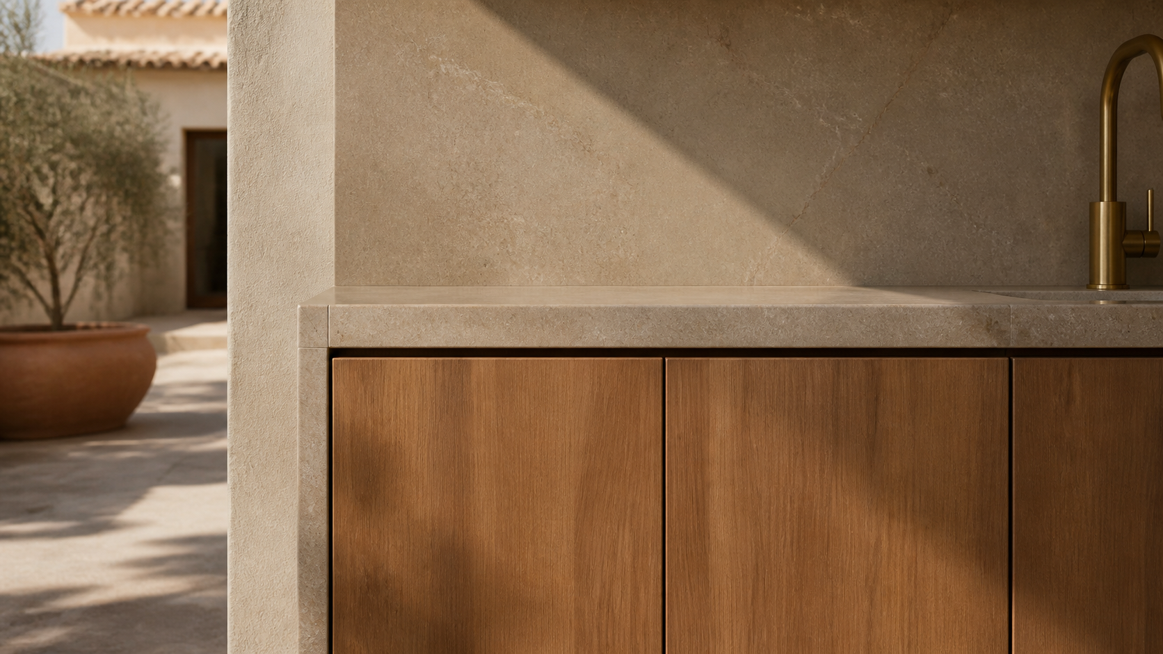 Fadior Armarios Meridian Kitchen with Porcelain Courtyard Climate Plane — close-up of stainless steel finish and hardware
