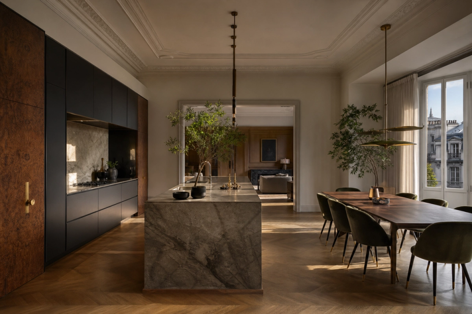 Fadior Milan 120 sqm Kitchen Penthouse — Milan kitchen penthouse with marble island, walnut cabinetry, parquet floor, dining table, window daylight, and brass lighting