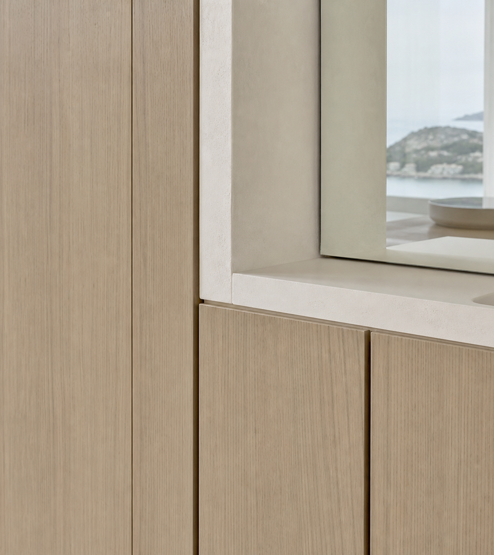 Fadior Nacre Bath and Vanity Suite with Handleless Mirror Storage Bay — close-up of stainless steel finish and hardware