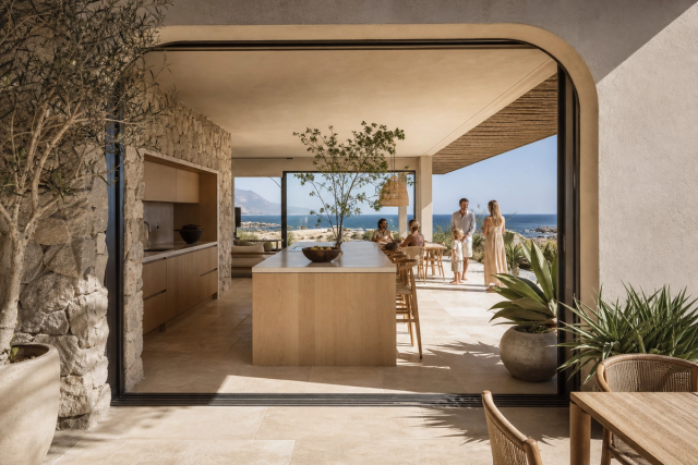 Fadior Cape Town 600 sqm Kitchen Villa — limestone arch, kitchen island, teak ceiling, ocean window, travertine floor