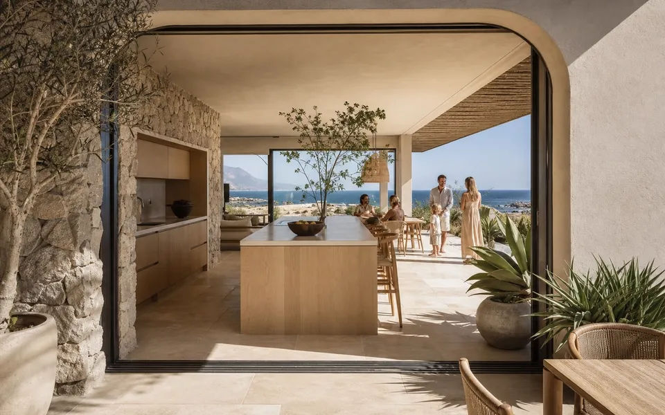 Fadior Cape Town 600 sqm Kitchen Villa — limestone arch, kitchen island, teak ceiling, ocean window, travertine floor — 304 stainless steel cabinetry installation by Fadior