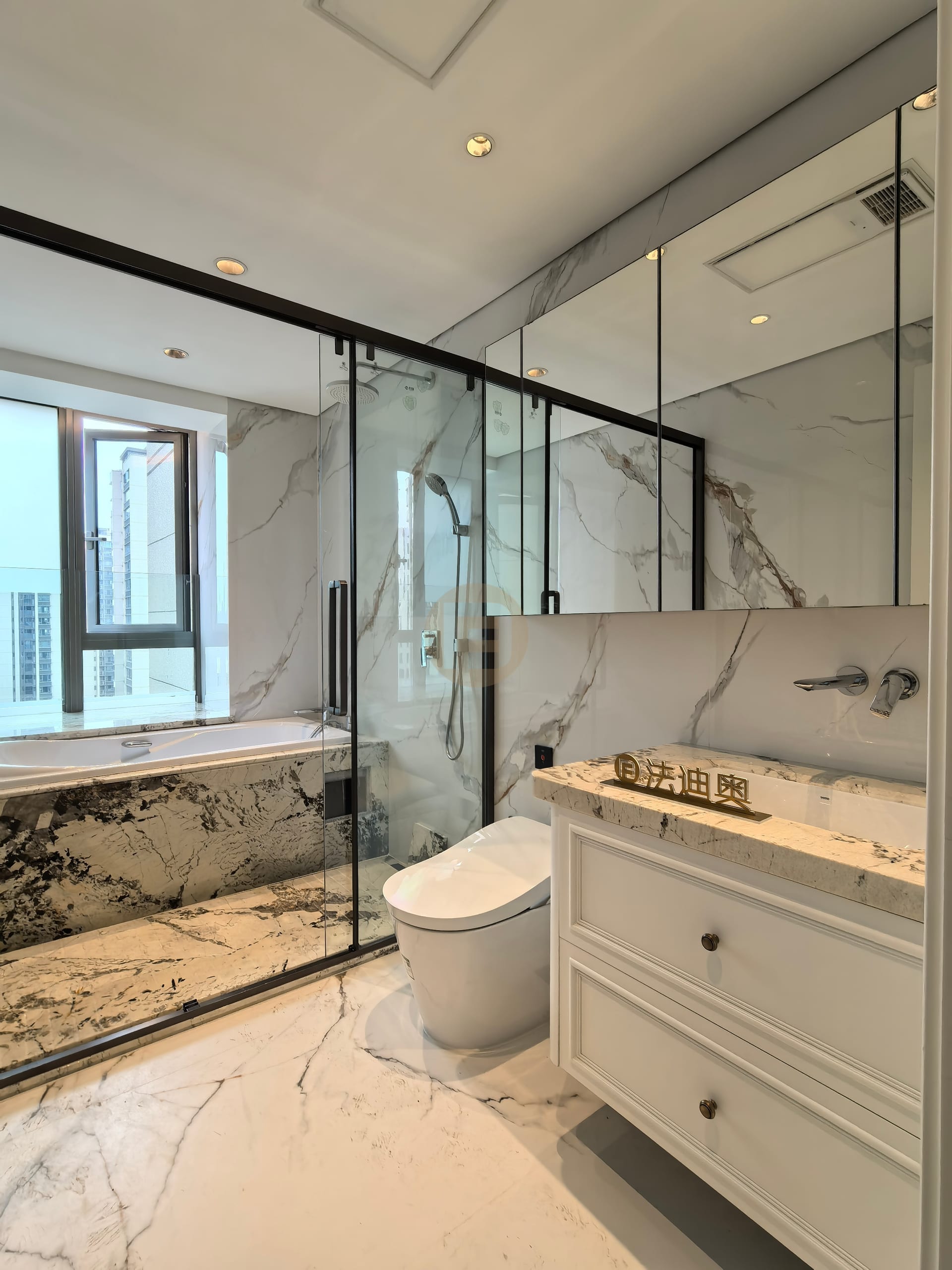 Marble bathroom with built-in tub, glass shower and white stainless steel vanity under a granite top