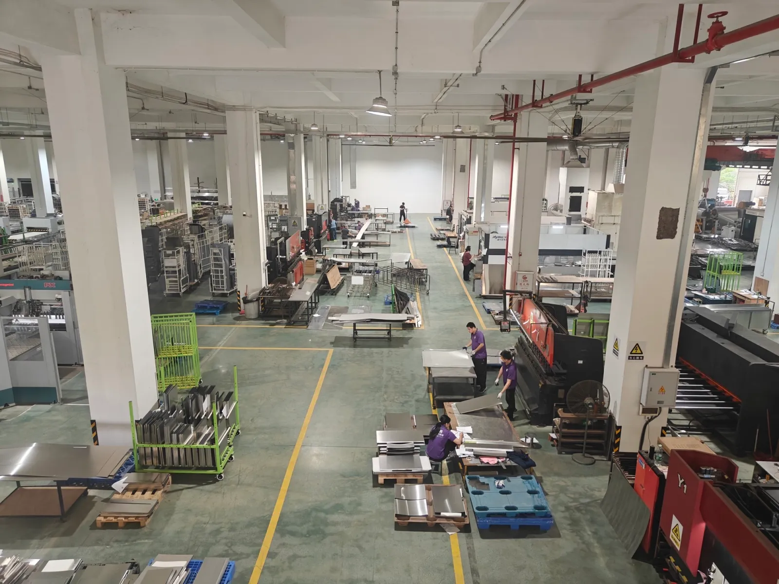 Wide Fadior manufacturing floor showing stainless steel production at scale