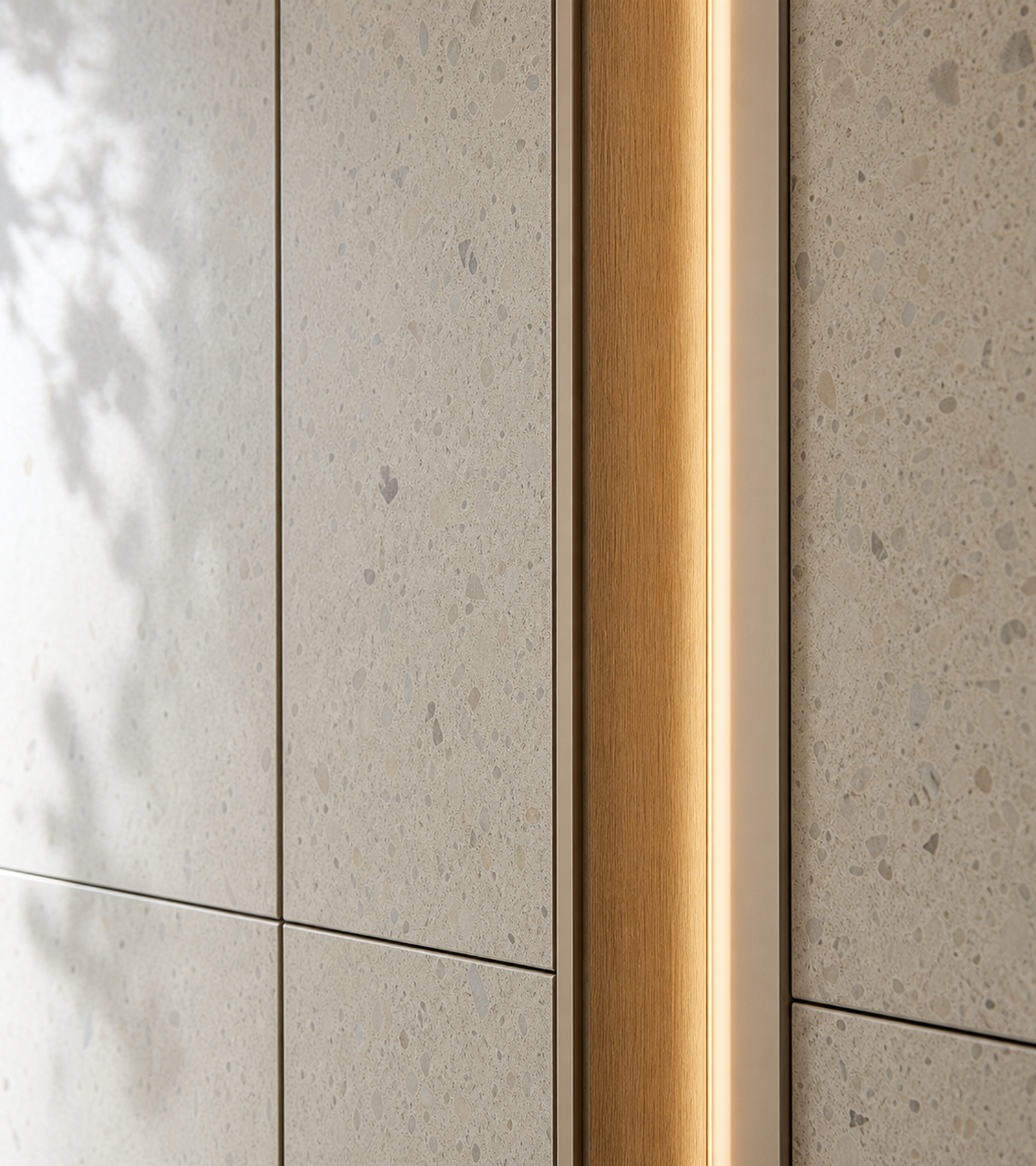 Fadior Terrazzo Wall Panel Suite with Veined Gallery Light Spine — close-up of stainless steel finish and hardware detail