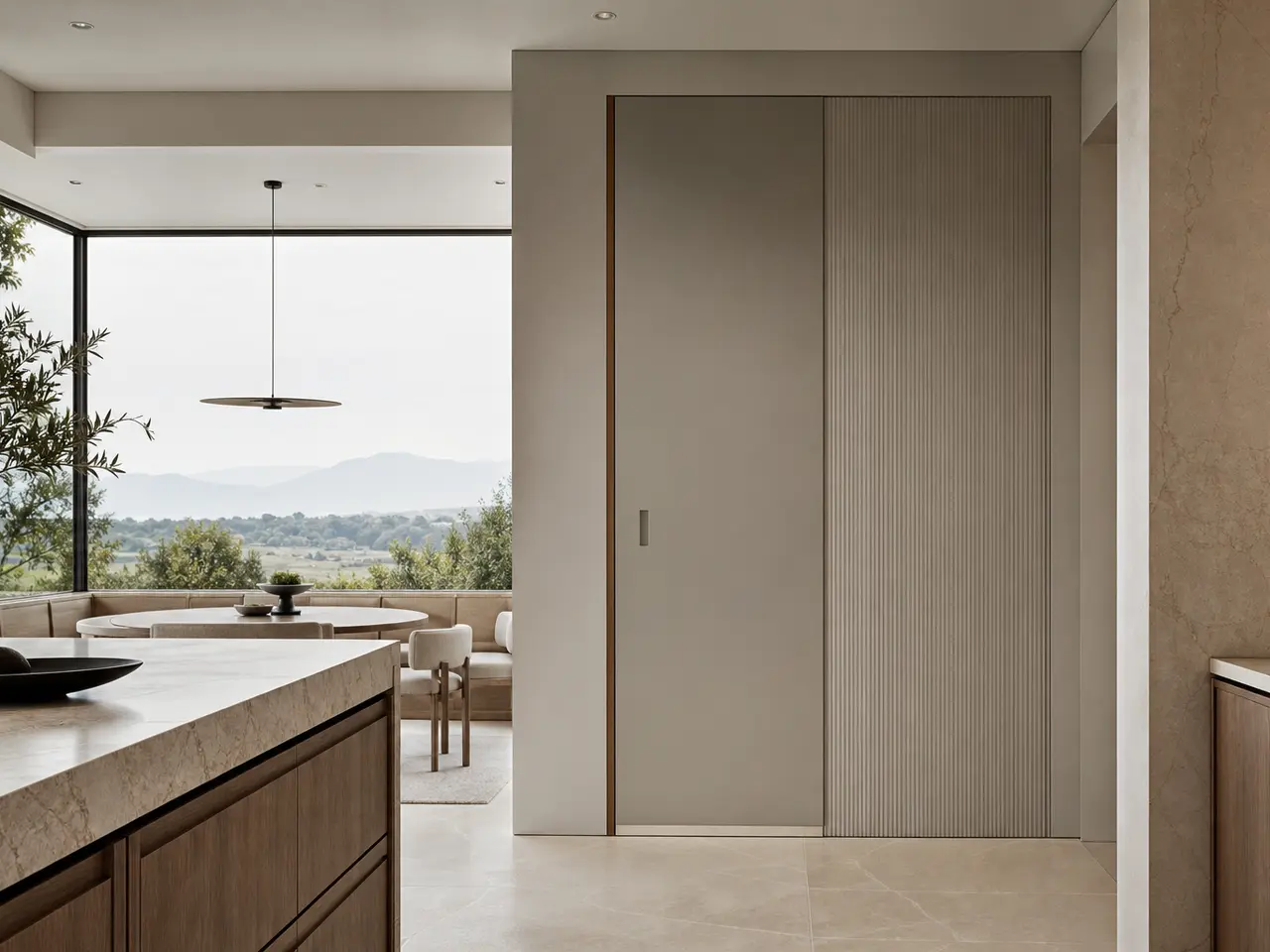 Fadior Alabaster Interior Door Suite with Pearl Reeded Pocket Door - full-height stainless steel interior door with concealed frame, quiet hardware, and matching wall panel continuity
