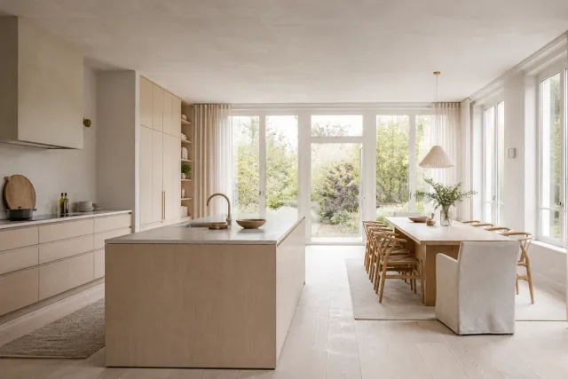 Fadior Amsterdam 450 sqm Kitchen Bath Villa — A full light-wood kitchen and dining room with a broad island, tall cabinets,