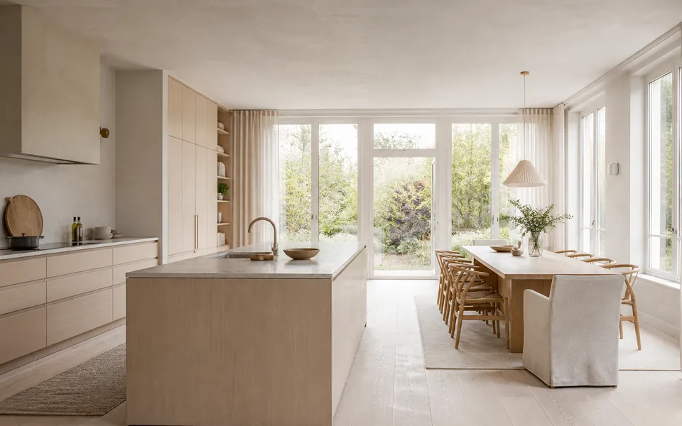 Fadior Amsterdam 450 sqm Kitchen Bath Villa — A full light-wood kitchen and dining room with a broad island, tall cabinets, — 304 stainless steel cabinetry installation by Fadior