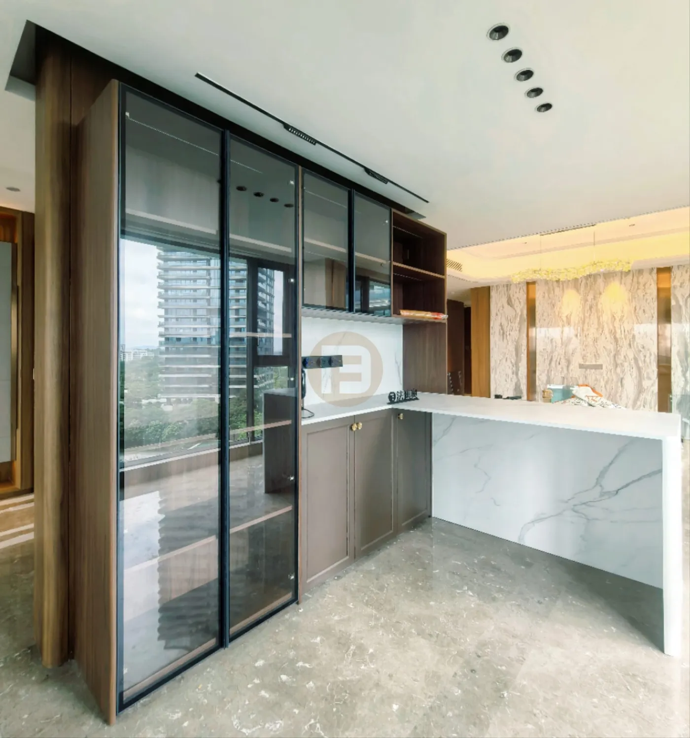 Smoked-glass bar cabinet and marble-wrapped serving counter off the living area