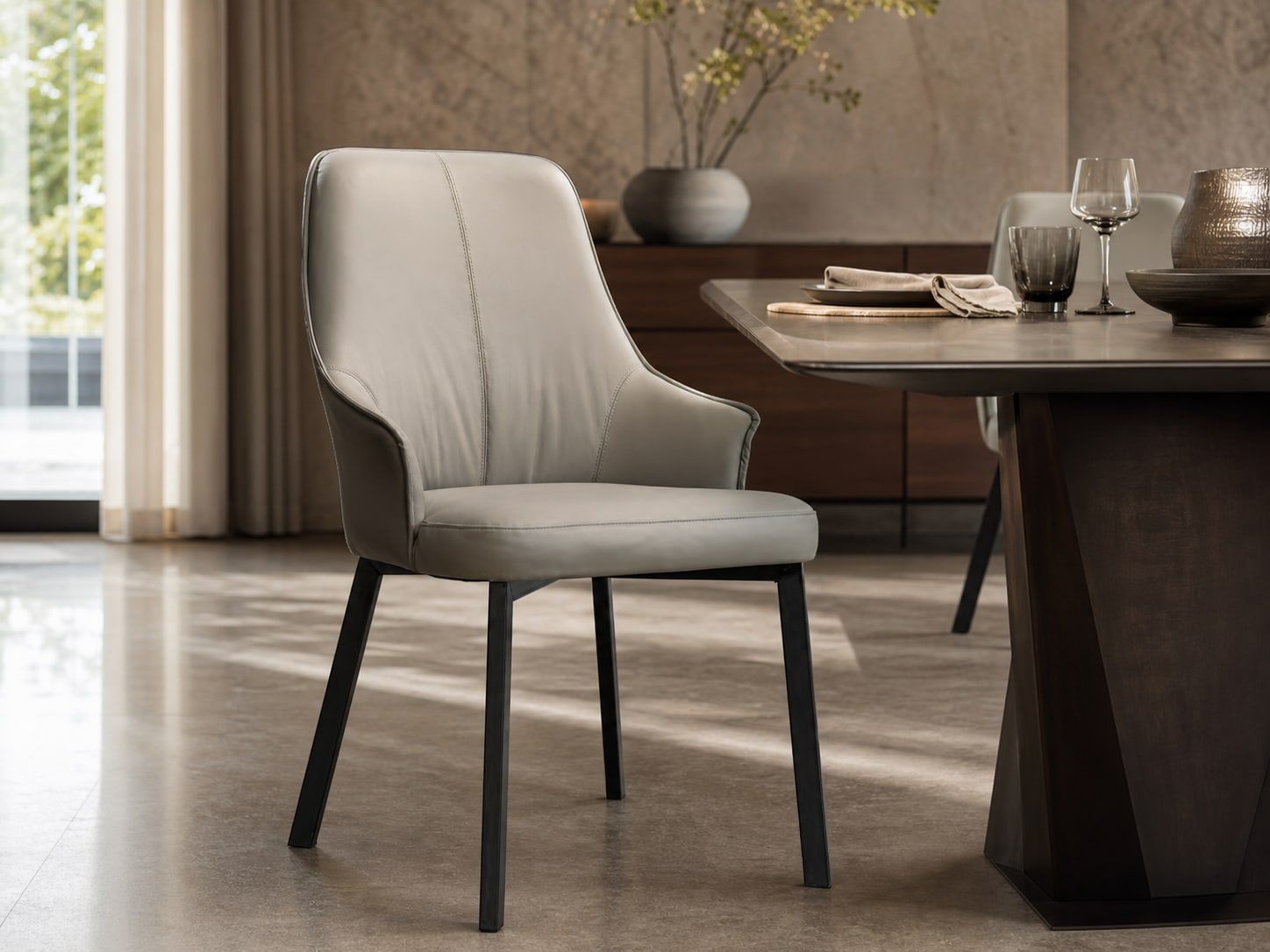 Leather-Accent Dining Chair (Carbon steel) styled in a FADIOR HOME interior setting