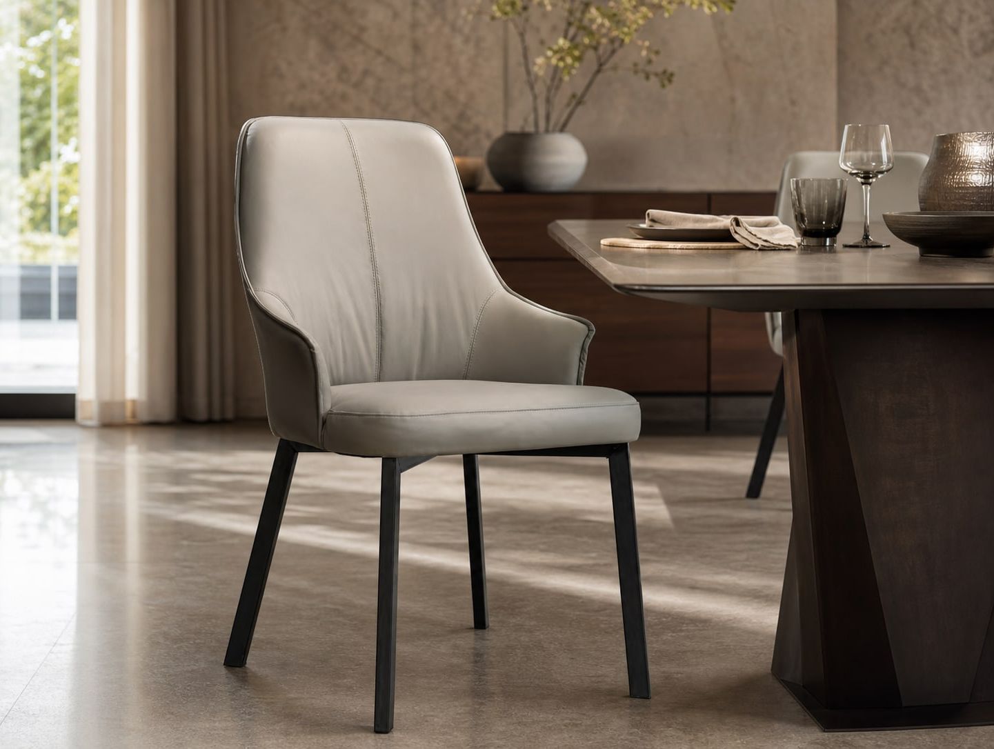 Leather-Accent Dining Chair styled in a FADIOR HOME interior setting