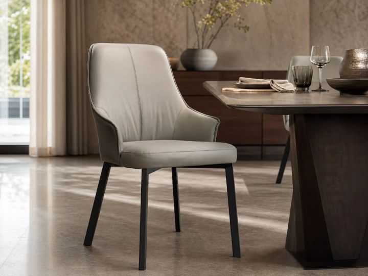 Leather-Accent Dining Chair styled in a FADIOR HOME interior setting