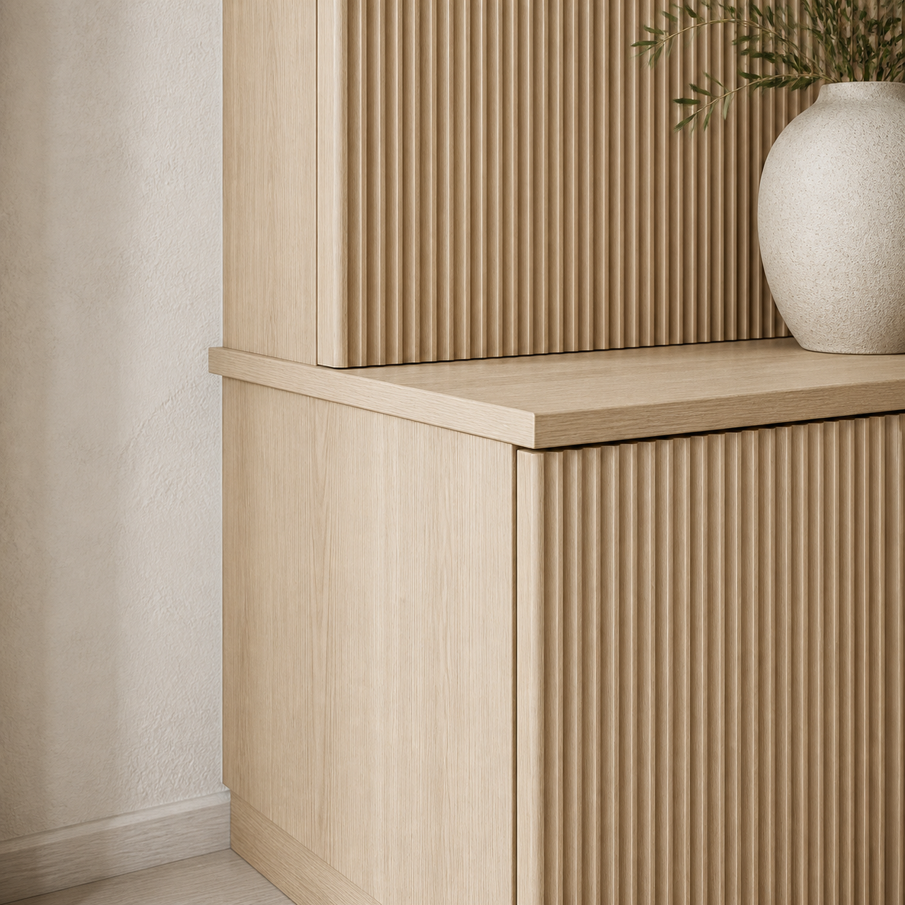 Fadior Silvan Living Room Suite with Fluted Sofa Library Wall — close-up of stainless steel finish and hardware detail
