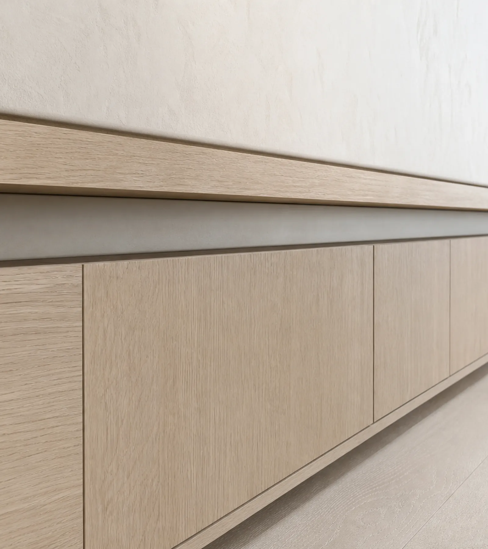 Fadior Patina Living Room Suite with Ribbon Ledge Audio Wall — close-up of stainless steel finish and hardware detail
