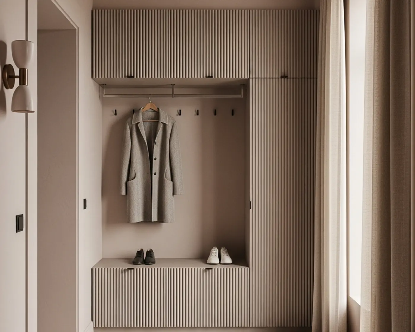 Stainless steel entryway storage with shoe bench, coat hooks, tall cabinet doors, and warm residential finishes