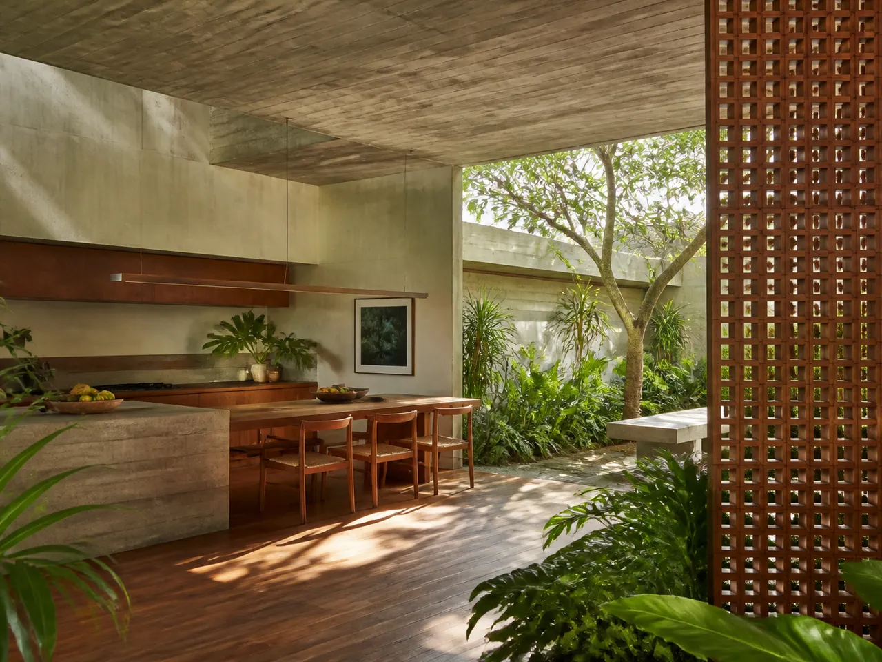 Tropical courtyard kitchen with concrete, timber, and lush planting in a calm editorial atmosphere view. — 304 stainless steel cabinetry editorial by Fadior