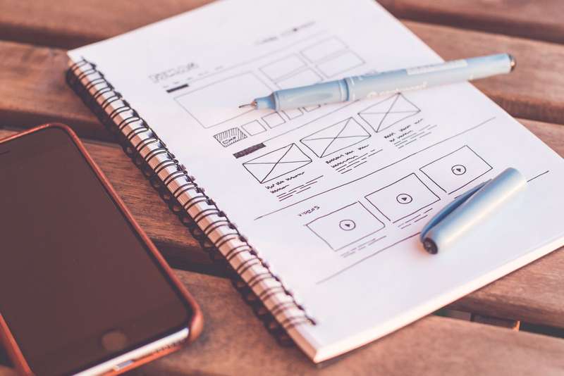 A designer working on a medical website layout