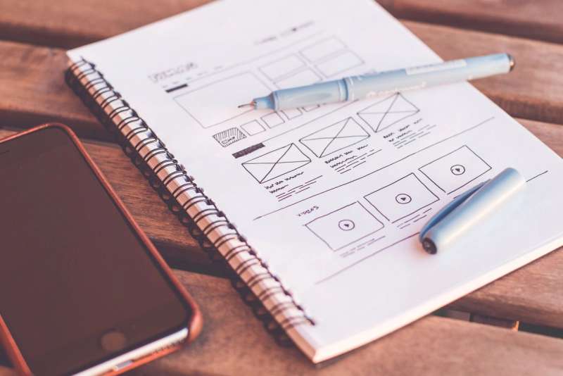 A designer working on a medical website layout