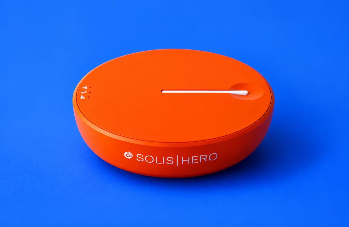 Orange Solis Hero portable WiFi hotspot device on a blue background.