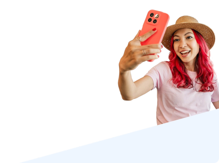 Woman taking a selfie with her phone at the airport